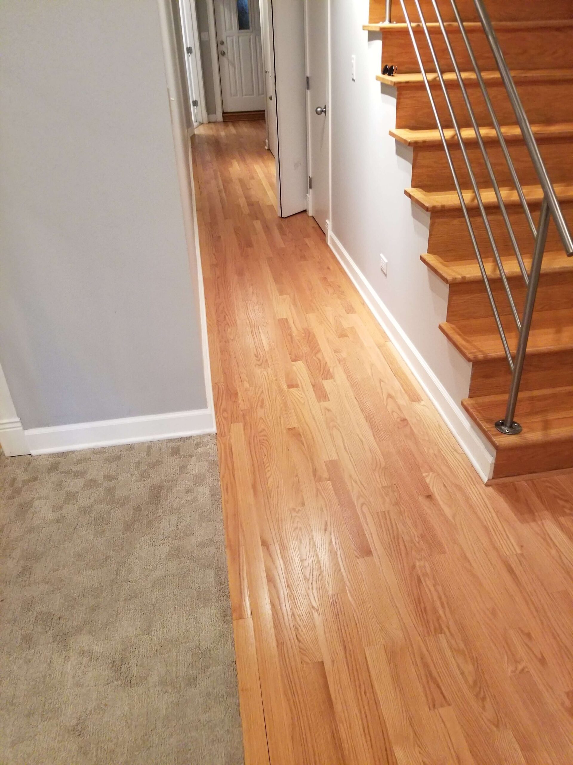Hardwood floors refinishing, new carpet installation, painting and new railing