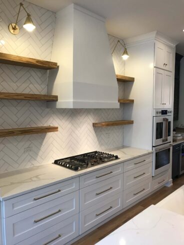 Kitchen remodel with custom hood